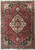 Brick burgundy Persian Bakhtiar rug with ivory star medallion and deep navy floral corner spandrels