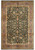 Full view of 9'9" x 14' dark green Agra rug with lavender border and golden floral vines