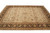 Large 10x14 Oriental rug seen from the foot end, ivory all-over floral field with olive vines