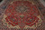 Close floor angle on ivory spandrels, blue palmettes and red field of the Isfahan design
