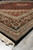 Low angle along the border of the 7x10 Persian Tabriz rug showing crisp floral drawing