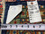 Back tag reading rug number 6652 with tape measure confirming the 9'10" x 13'6" size