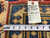 Back tag reading rug number 77290 with tape measure confirming the 9'7 x 13'9 size