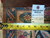Reverse side with tape measure and tag reading rug number 6097a, size 9.9 x 12.9