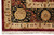 Detail of the corner border with gold rosette cartouches on black and beige outer guard