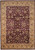 Maroon field rug with gold floral border and all over Kashan design, full overhead view