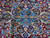 Sapphire blue central medallion detail with gold outlines, rose blossoms and olive green leaf tendrils