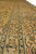Border close-up with brown outlines, sage green leaves and coral accents on golden ground