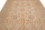 8x11 Chobi rug field detail with rust coral palmettes, rosettes and scrolling vines