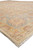 Corner detail showing ivory fringe, golden guard border and pale blue palmette border stripe
