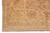 Corner detail of the golden beige main border with rust vines and sage leaf accents