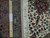 Ruler on the back showing fine 400 knots per square inch hand-knotted Persian weave