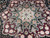 Detail of layered center medallion, silk highlighted florals and mirrored arabesque leaf scrolls