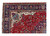 Corner close up of navy main border with rosettes, leafy sprays and ivory cartouche medallions