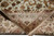 9x12 hand-knotted rug folded back to reveal tight weave, crisp knotting and cotton foundation
