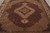 8x10 Mahi design rug photographed lengthwise showing matching ivory pendants above and below the medallion