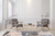 Modern living room with grey armchairs and the 12x19 Moroccan design rug grounding the seating area