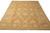 Angled full view of hand-knotted Chobi Peshawar rug showing camel field, ivory border and cotton fringe