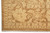 Corner detail of the ivory main border, guard stripes and hand-tied fringe on cotton warps