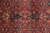 Detail of all over floral lattice in rust, emerald green, ivory and soft blue wool