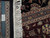 Ruler and authentic hand-knotted tag beside hand-tied fringe, showing fine knots per square inch