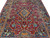 Perspective along the red field showing vase cartouches, bird spandrels and the center medallion