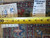 Back of rug with dealer tag number 6157 and tape measure showing fine hand-knotted weave