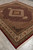 Vertical angle view of 8x10 Oriental rug showing medallion, pendant and ivory main border