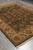 7'11" x 10' Jaipur rug angled full view with black field and ivory border