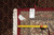 Reverse side with inventory tag reading 8.2 x 10.2 beside a measuring tape