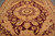 Medallion framed by curling vines, ivory palmettes and gold spandrels in soft wool pile