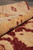 Rolled edge of the 9x12 Zigler rug revealing dense wool pile and supple handle