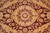 Close-up of the medallion with 8 leaf rosettes ringing a plain gold roundel
