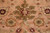 Macro detail of an 8 petal rosette in olive green with burgundy and ivory accents