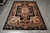 6' x 9' Chinese Aubusson silk rug photographed flat showing black field and ivory medallion