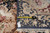 Tape measure and back tag on the reverse, confirming 6' x 9' hand-knotted construction