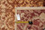 Rug back with tape measure and genuine hand woven Oriental rug tag marked PIX-6009