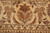Border and field junction showing rust palmette, ivory blossoms and layered guard stripes
