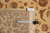 Tape measure and tag reading F-4162 confirming the 9'1" x 12'4" hand-knotted rug size
