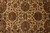 Detail of all over floral design with burgundy palmettes, olive leaves and ivory background