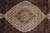 Detail of the ivory lobed medallion with rose, olive and charcoal herati flowerheads