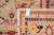 Back of rug with tape measure and tag marked F-4313, confirming the 10' x 11'9" size