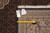 Back tag marked F-4463 with tape measure confirming the 8'3" x 10'3" measurement