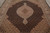 8x10 wool and silk rug detail showing black field and scalloped ivory medallion
