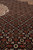 Herati fish pattern field detail with ivory rosettes, rust leaves and light blue accents