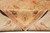 Back of the rug folded over the front, showing hand-knotted weave and matching color clarity