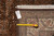 Reverse side with inventory tag reading 8'1" x 10' and tape measure confirming rug dimensions