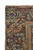 Corner detail of camel brown border with cobalt rosettes, ivory vinework and hand-knotted wool pile