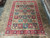 Full overhead photograph of the 10' x 12'4" Bakhtiar garden design wool rug, excellent condition