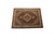 Made in India, this wool and silk rug angled on white showing ivory border and burgundy field